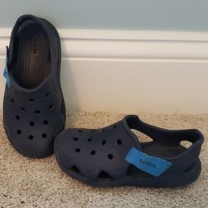 Crocs.  Size 10.  For land or sea.
